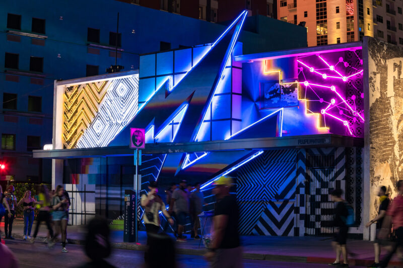 A geometric mural by artist Felipe Pantone, accentuated by neon lights from YESCO.
